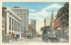 DAYTON OHIO~WEST FOURTH STREET-CARS-STOREFRONTS-ROARING 1920s POSTCARD