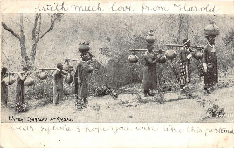 br104385 water carriers at masasi africa real photo nigeria folklore costume