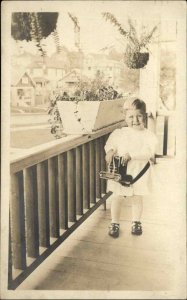 Boy on Porch Old Camera Kansas City MO 1910 Cancel Real Photo Postcard