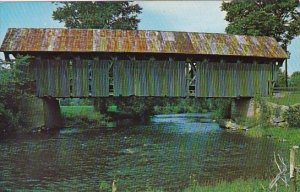 Old Covered Bridge Spanning The Black River In Coventry Vermont