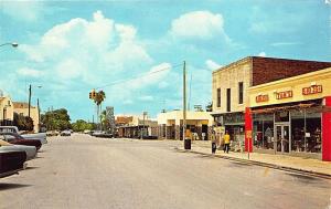 Frostproof FL Street View Store Fronts Tom's 5 & !0 cent Store Old Cars Postcard