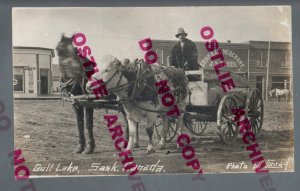 Gull Lake SK CANADA RPPC '10 GENERAL STORE Main Street COW CART nr Swift Current