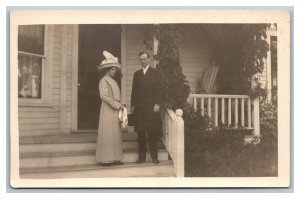 Vintage 1910's RPPC Postcard - Couple in Front of Suburban Home Large Hat