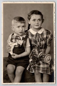 RPPC Cutest Children With Toys Plaid Dress c1940  Postcard L21