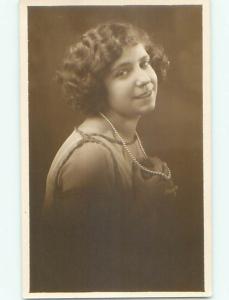 Pre-1924 rppc PRETTY GIRL SHOWS OFF HER PEARL NECKLACE JEWELRY o2451