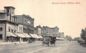 MITCHELL STREET CADILLAC MICHIGAN POSTCARD (c. 1910)