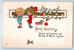 1914 Christmas Children With Gifts Candle Lights Embossed New York NY Postcard