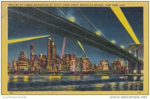New York City Skyline Of Lower Manhattan At Night From Under Brooklyn Bridge ...