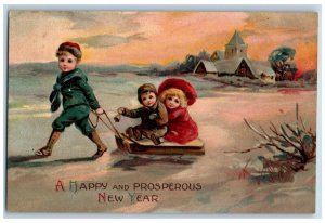 New Year Postcard Children Sledding Winter Embossed c1910's Posted Antique