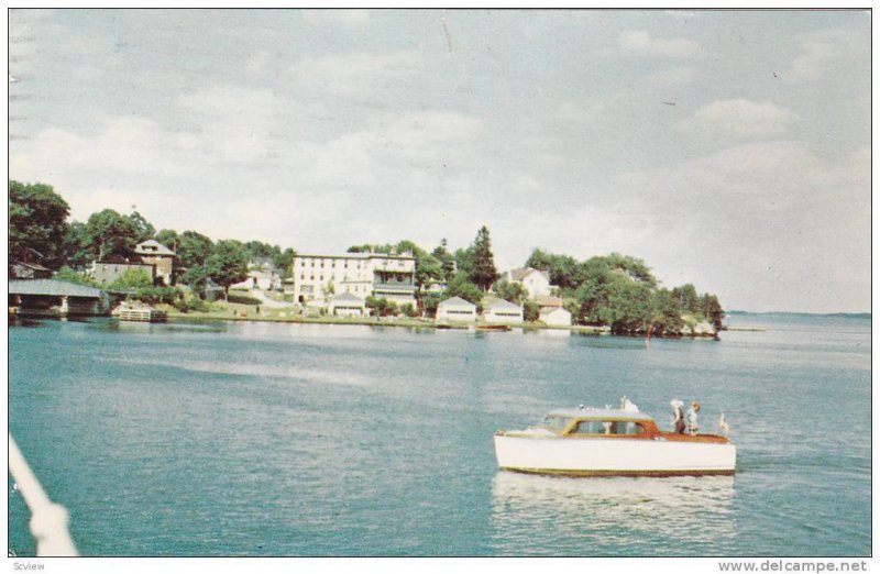 Thousand Island Tour Boat passes Gananoque Inn, Ontario, Canada, PU-1988