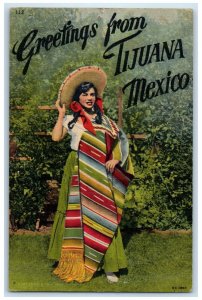 1910 Greetings From Tijuana Woman Wearing Hat Scene Mexico MX Posted Postcard