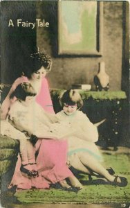 Gaudy Hand colored Mother reading Fairytale 1919 RPPC Photo Postcard 21-1829