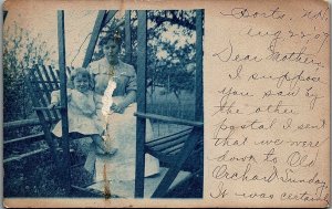 1907 MOTHER AND DAUGHTER IN GLIDER SWING REAL PHOTO RPPC POSTCARD 34-199