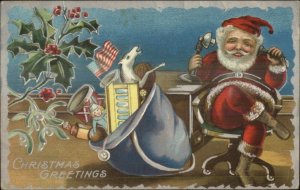 Christmas - Santa Claus at Desk on Telephone c1910 Postcard