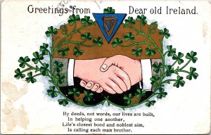 VINTAGE POSTCARD GREETINGS FROM DEAR OLD IRELAND CLOVERS HANDSHAKE UK TO US 1910