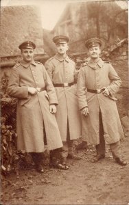 RPPC WWI Germany, Soldier Portrait, Uniform, Belt Buckle, 3 Officers (?) w Coats