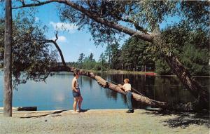 PAW PAW MICHIGAN GREETINGS FROM POSTCARD 1960s YOUNG BOY & WOMAN FISHING