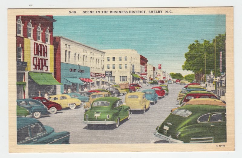 P2250, vintage postcard many old cars signs etc business district shelby N.C.