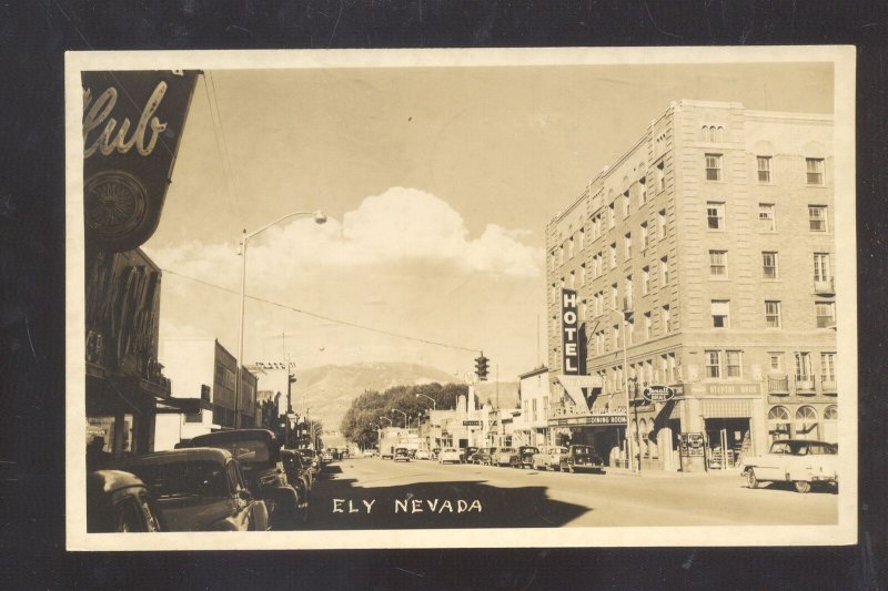 RPPC ELY NEVADA DOWNTOWN STREET SCENE OLD CARS REAL PHOTO POSTCARD