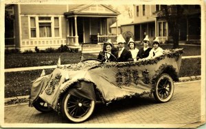 RPPC 1918 People in Parade Car Float White Pointed Hats Real Photo Postcard