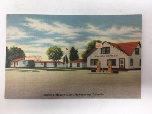 Walsenburg CO Postcard Gas Pumps Norton's Modern Court Linen