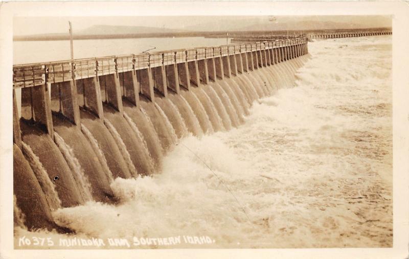 Idaho~Minidoka Dam~Gates Open~c1930s RPPC Postcard