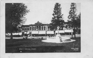 H47/ West Union Iowa RPPC Postcard 1907 Monument Stores Park Square