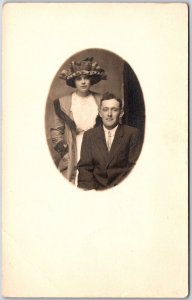 Couple Photograph  Woman Fancy Hat Headress Real Photo RPPC Postcard