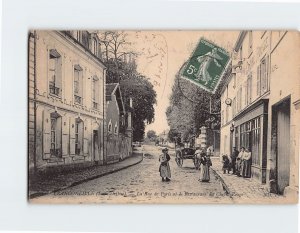 Postcard La Rue de Paris et le Restaurant du Chevill Rouge Franconville France