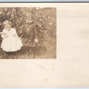 c1910s Cute Children RPPC Outdoor Kids Girl Doll Classy Boy Real Photo PC A251