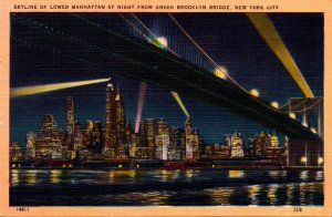 New York City Skyline Of Lower Manhattan At Night From UNder Brooklyn Bridge ...