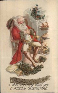CHRISTMAS Santa Claus Taking Nap APPLIQUE GLITTER Vintage Postcard