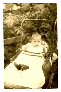 Children - Unhappy Baby in Carriage     *RPPC