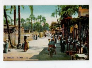 3098873 EGYPT Assuan A street & types Vintage colorful PC