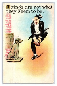 Comic Drunk Kicks Dog Statue Things Are Not What they Seem DB Postcard S2