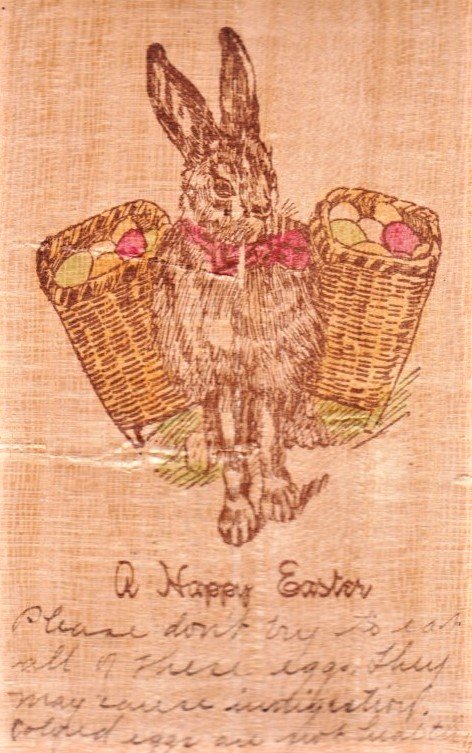 Unique Easter PC on wood. Has a Easter Bunny with saddle bags on both sides.