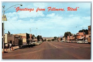 c1960 Greetings From Main Street Scene Capital City Road Fillmore Utah Postcard