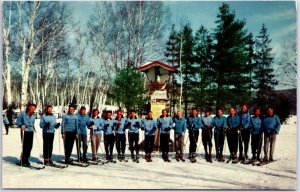 VINTAGE POSTCARD INSTRUCTING STAFF AT THE SNOW EAGLE SKI SCHOOL ST JOVITE QUEBEC