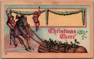 Vintage CHRISTMAS Postcard Jester / Yule Log Scene - Joseph Hoover & Sons UNUSED 