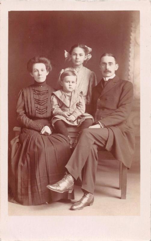 FAMILY~HUSBAND~WIFE~DAUGHTER~SON~POSE VICTORIAN PERIOD REAL PHOTO POSTCARD 1918