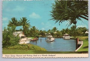 Ocean-Going Pleasure And Fishing Boats In A Florida Backyard, 1976 Postcard