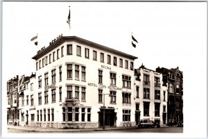 Postcard RPPC Rotterdam Netherlands Hotel Regina Cafe Restaurant Flags