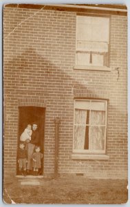 Postcard RPPC c1910s Europe A Women with Three Children New Year Greetings