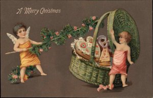 Christmas Cherub Children Basket of Cookies & Candy c1910 Embossed Postcard