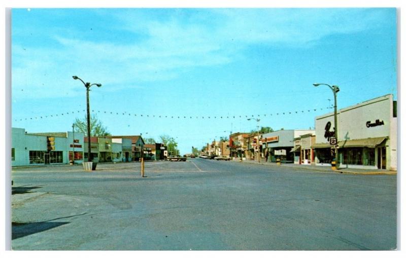 1960s Main Street, Wolf Point, MT, Ben Franklin, Ace Hardware Postcard