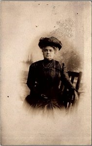 c1910 ST LOUIS SOLEMN LADY BLACK BEADS GLOVES BIG HAT RPPC PHOTO POSTCARD 36-146