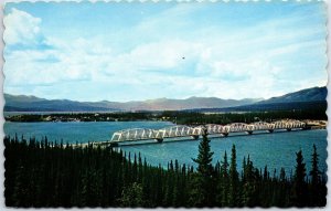 VINTAGE POSTCARD NISUTLIN BAY BRIDGE ON THE ALASKAN HIGHWAY YUKON CANADA