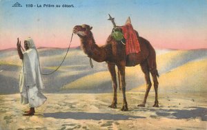 Cultures & Ethnicities ethnic type with camel desert pray vintage postcard