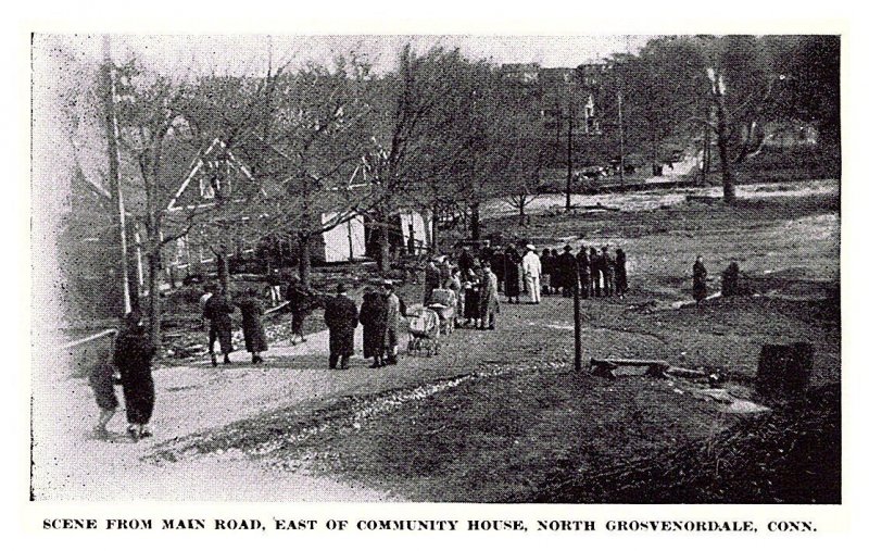 Connecticut  North Grosvenordale people watching flooded river