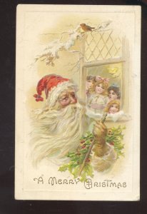 SANTA CLAUS AT WINDOWN GIRLS VINTAE CHRISTMAS POSTCARD SKYKOMISH WASH.